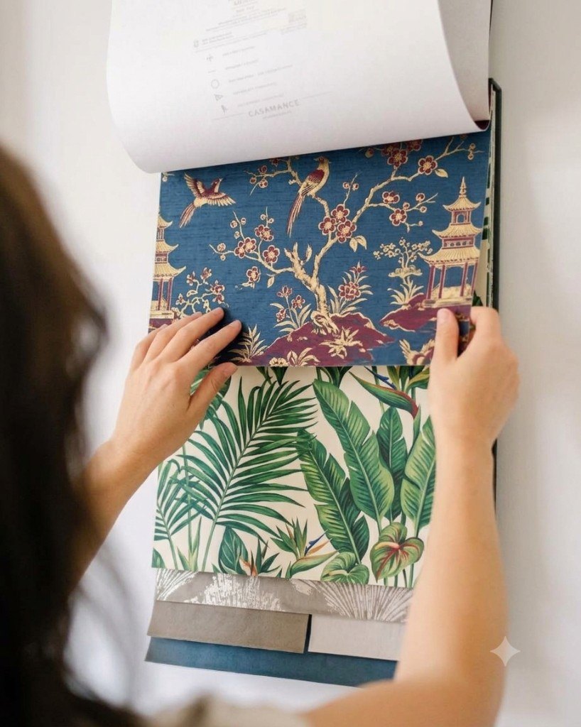 Browsing a wallcovering sample book